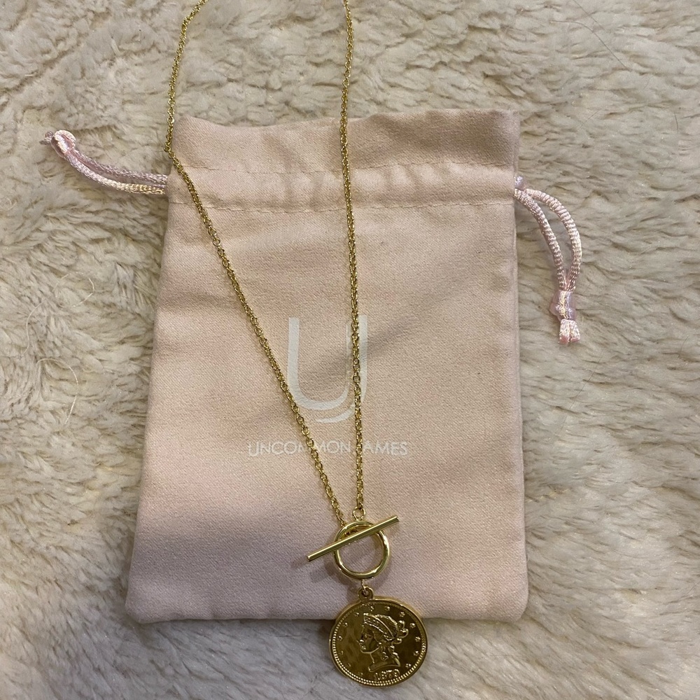 Uncommon James coin necklace